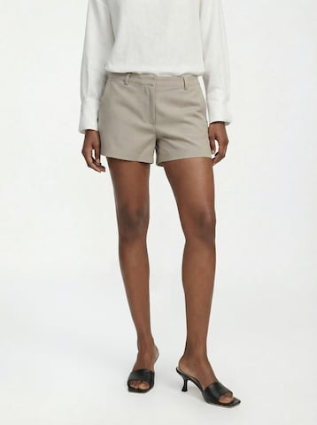 The Base Theory Slimfit Παντελόνι σε μπεζ: μπροστά