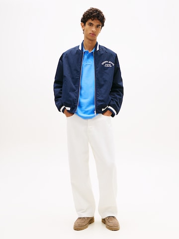 Tommy Jeans Átmeneti dzseki 'VARSITY' - kék