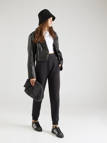 Calvin Klein - Tapered Calças em preto