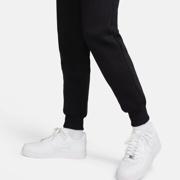 Nike Sportswear Zúžený Sportovní kalhoty 'Phoenix Fleece' – černá