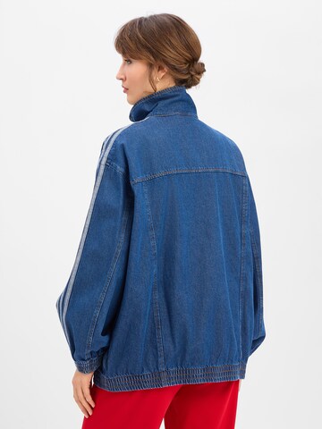 ADIDAS ORIGINALS Tussenjas 'Firebird Adilenium' in Blauw