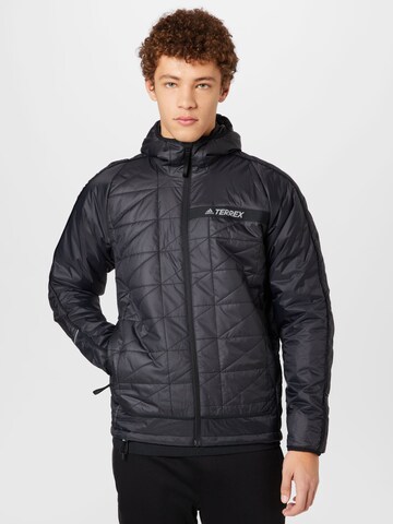 ADIDAS TERREX - Chaqueta de montaña en negro: frente