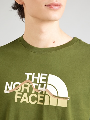 žalia THE NORTH FACE Marškinėliai 'MOUNTAIN LINE'