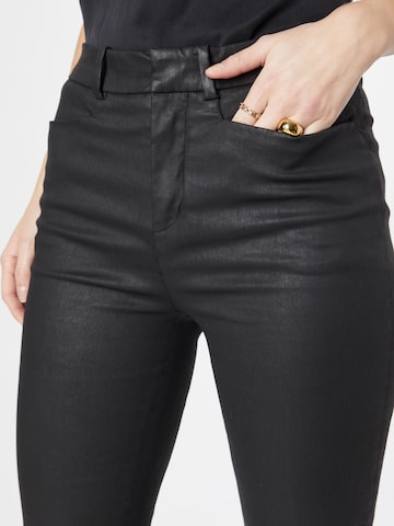 DRYKORN Flared Pants in Black