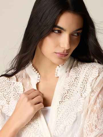 Camicia da donna di oltre in bianco