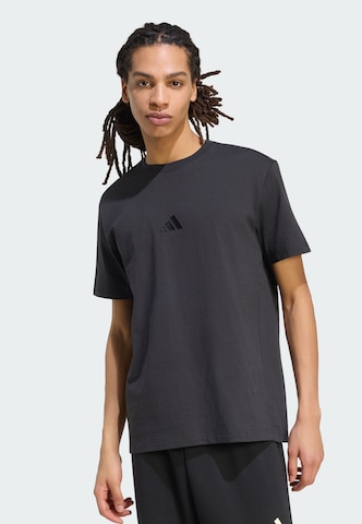 ADIDAS SPORTSWEAR - Camiseta funcional en negro: frente