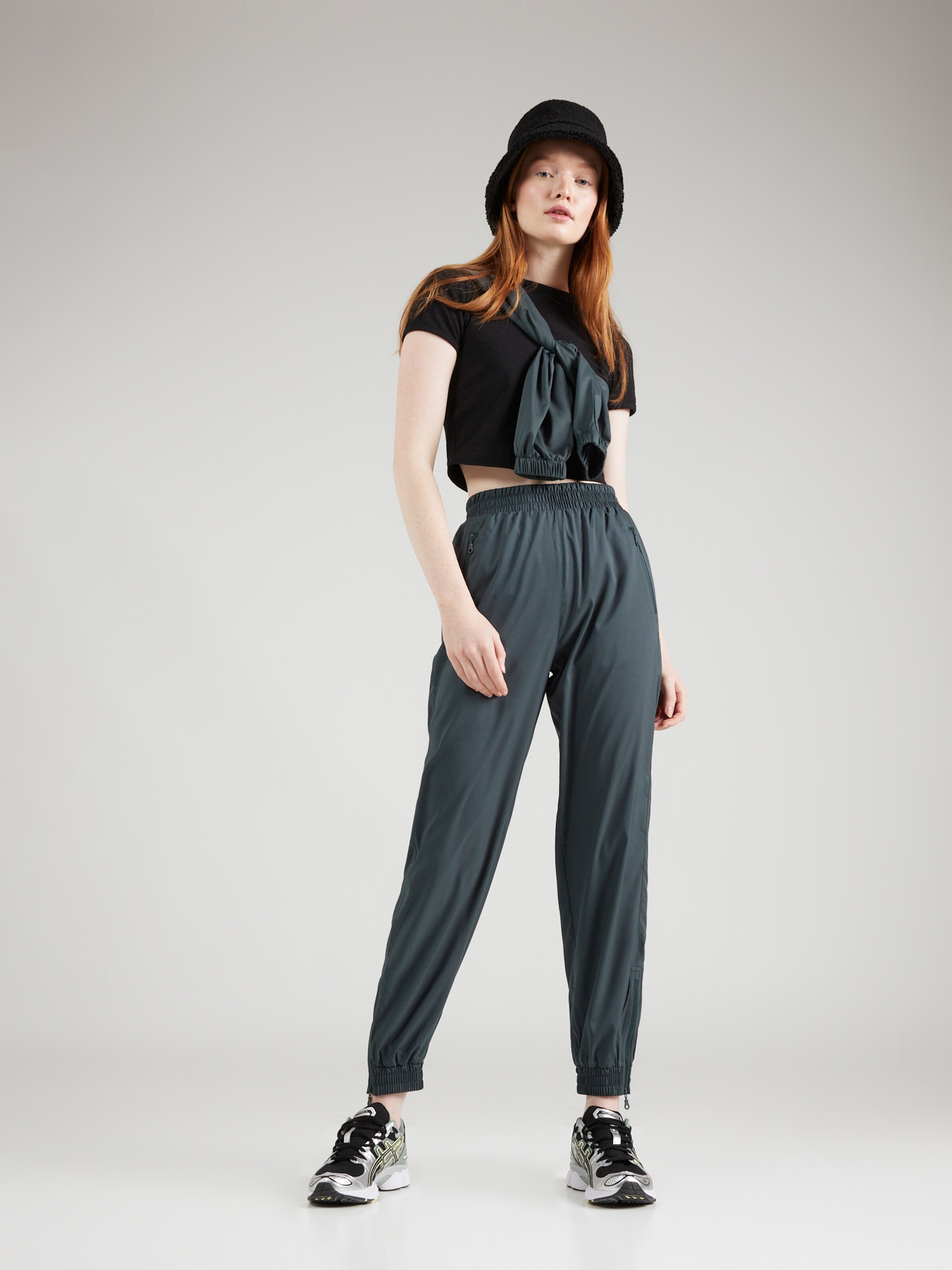 Girlfriend Collective Tapered Sports trousers Summit Track in Emerald ABOUT YOU