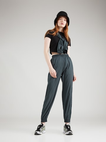 Girlfriend Collective Tapered Sports trousers 'Summit Track' in Green