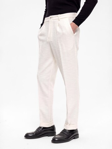 Loosefit Pantaloni con piega frontale di Antioch in beige