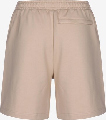 PUMA Regular Broek in Beige