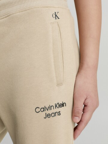 Calvin Klein Jeans Regular Pants 'Stack' in Beige