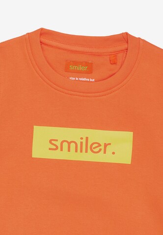 smiler. Sweatshirt in Oranje