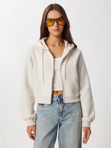 Veste de survêtement Hiccup en beige : devant