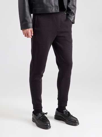 Tapered Pantaloni di Calvin Klein in nero: frontale