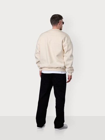 ESTEEM Collegepaita 'Blooming Season' värissä beige