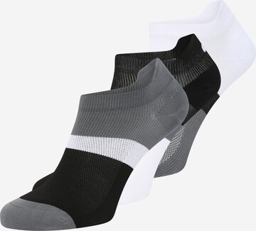 Chaussettes de sport ASICS en gris : devant