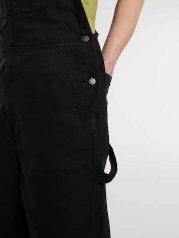 regular Pantaloni con pettorina di DICKIES in nero