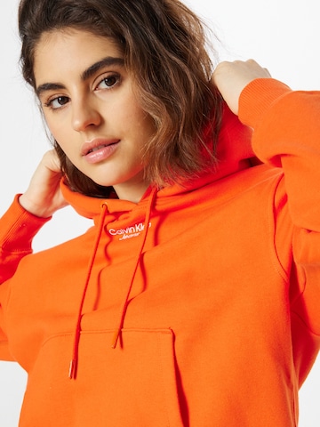 Calvin Klein Jeans Суичър в оранжево