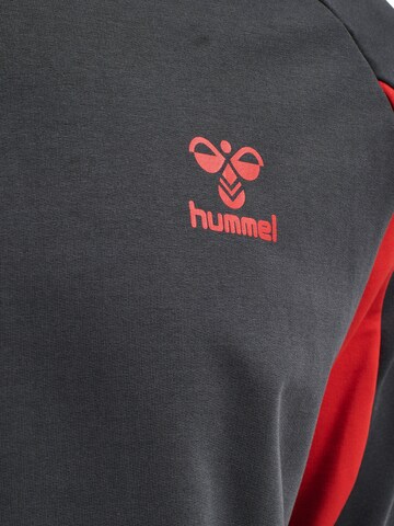 Hummel Sportsweatshirt 'Action' in Schwarz