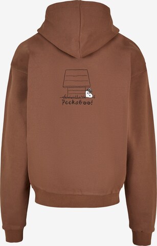 Merchcode Sweatshirt 'Peanuts - Peekaboo' in Brown