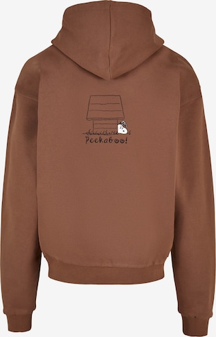 Merchcode Sweatshirt 'Peanuts - Peekaboo' in Bruin