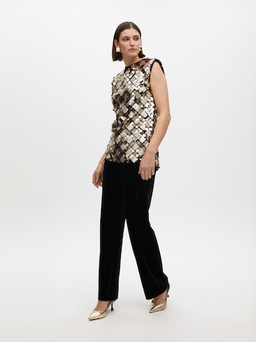 Haut Lola Casademunt en or