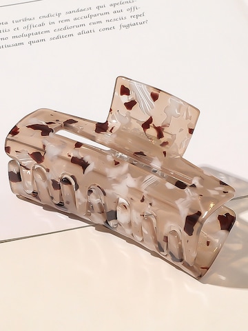 Ornement pour cheveux 'Aria Hair Clip - Light Tortoise' soho Hair accesoires en marron