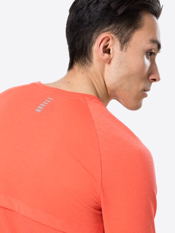 T-Shirt fonctionnel 'Streaker' UNDER ARMOUR en rouge