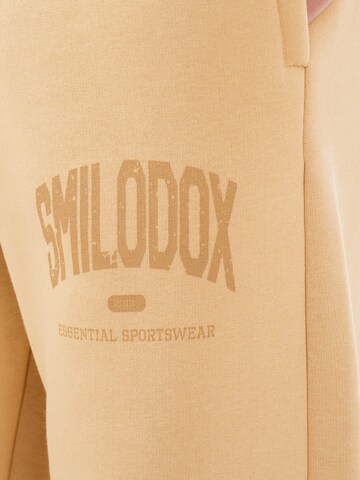 Loosefit Pantalon Smilodox en beige