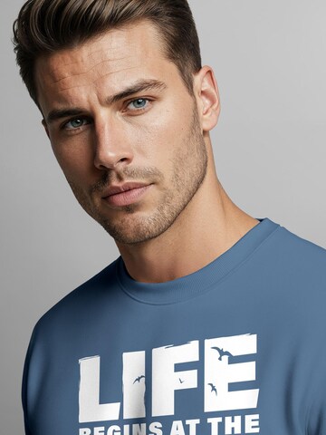 Neverless Sweatshirt 'life begins' in Blau