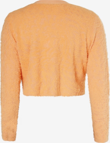 Cardigan swirly en orange