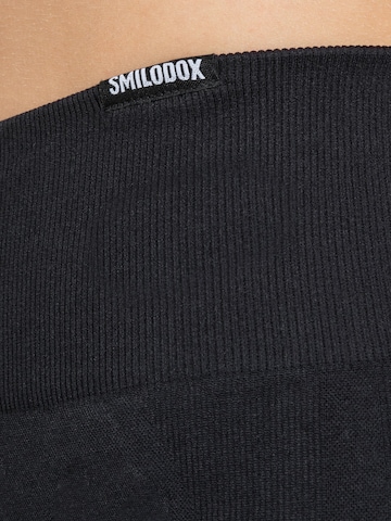 évasé Leggings Smilodox en noir