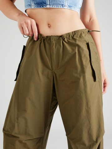 Tommy Jeans Široke hlačnice Hlače | zelena barva