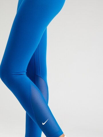 NIKE Skinny Sportbroek 'One' in Blauw