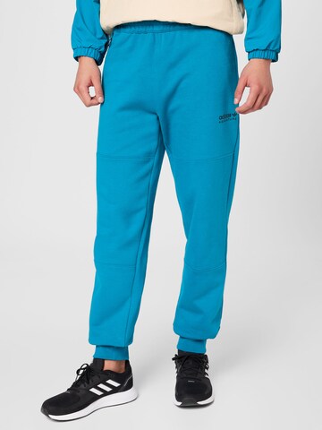 ADIDAS ORIGINALS Tapered Broek 'Adventure' in Blauw: voorkant