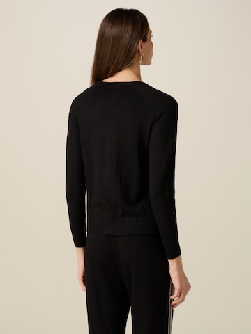 oltre - Jersey en negro