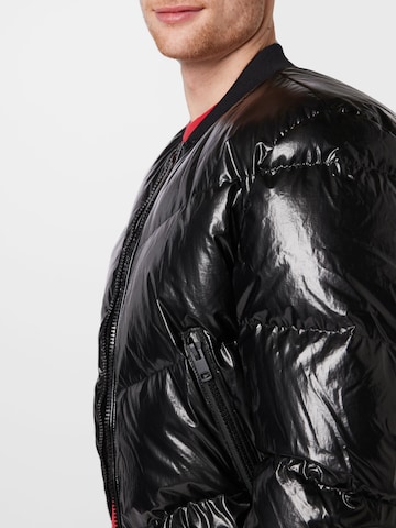 DIESEL Prehodna jakna 'STEN' | črna barva