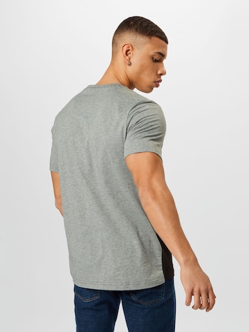 PUMA Sportshirt in Grau