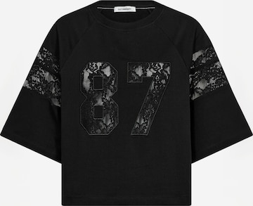 Haut ' Ely ' co'couture en noir : devant