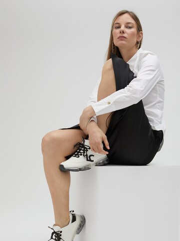 Baskets basses Lola Casademunt en blanc
