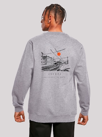 Sweat-shirt 'Escape Discover the World Town Train Station' F4NT4STIC en gris : devant