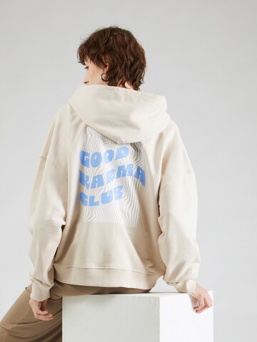 OH APRIL - Sudadera con cremallera 'Good Karma Club' en beige