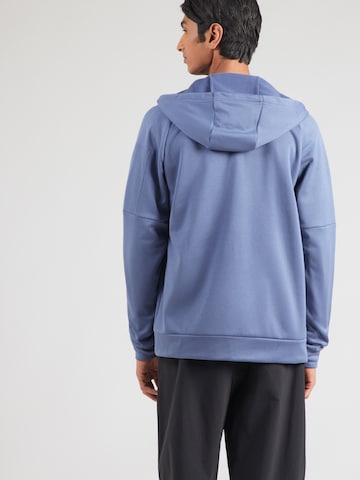 NIKE - Casaco de treino em moletão em azul