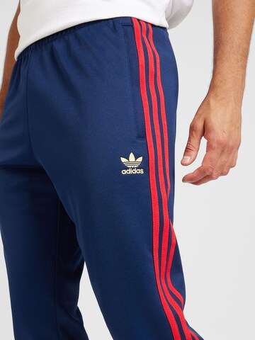 ADIDAS ORIGINALS Tapered Broek 'Adicolor Classics Sst' in Blauw