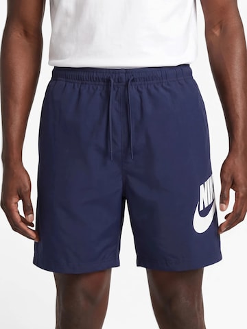 Nike Sportswear Voľný strih Nohavice 'CLUB' - Modrá
