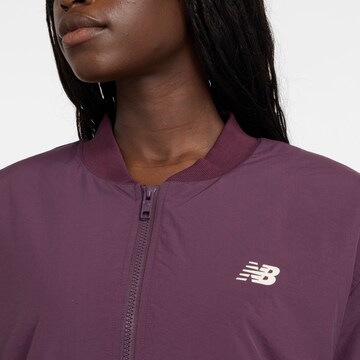new balance Tussenjas in Lila