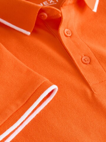 T-Shirt Next en orange