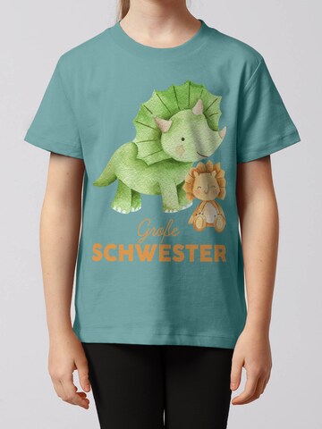 T-Shirt 'Dinosaurier 07 Große Schwester' watabout.kids en bleu : devant