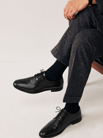 Chaussure à lacets Next en noir