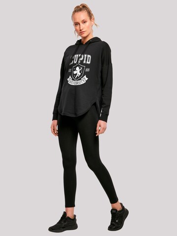 Sweat-shirt 'Cupid University Valentinstag' F4NT4STIC en noir